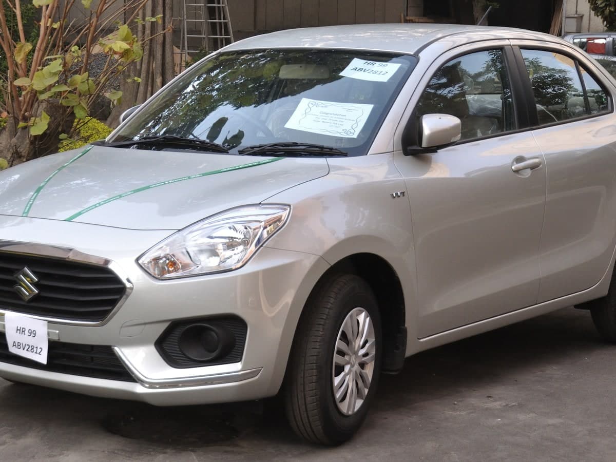 Maruti Suzuki Dzire Tourist Sedan - Swastik Tours Fleet